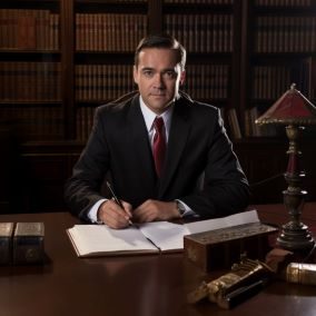 lawyer sitting at desk