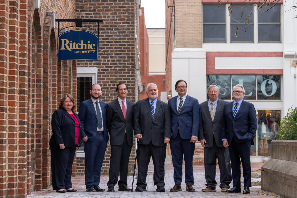 The attorneys of Ritchie Law Firm outside their Harrisonburg, Virginia office